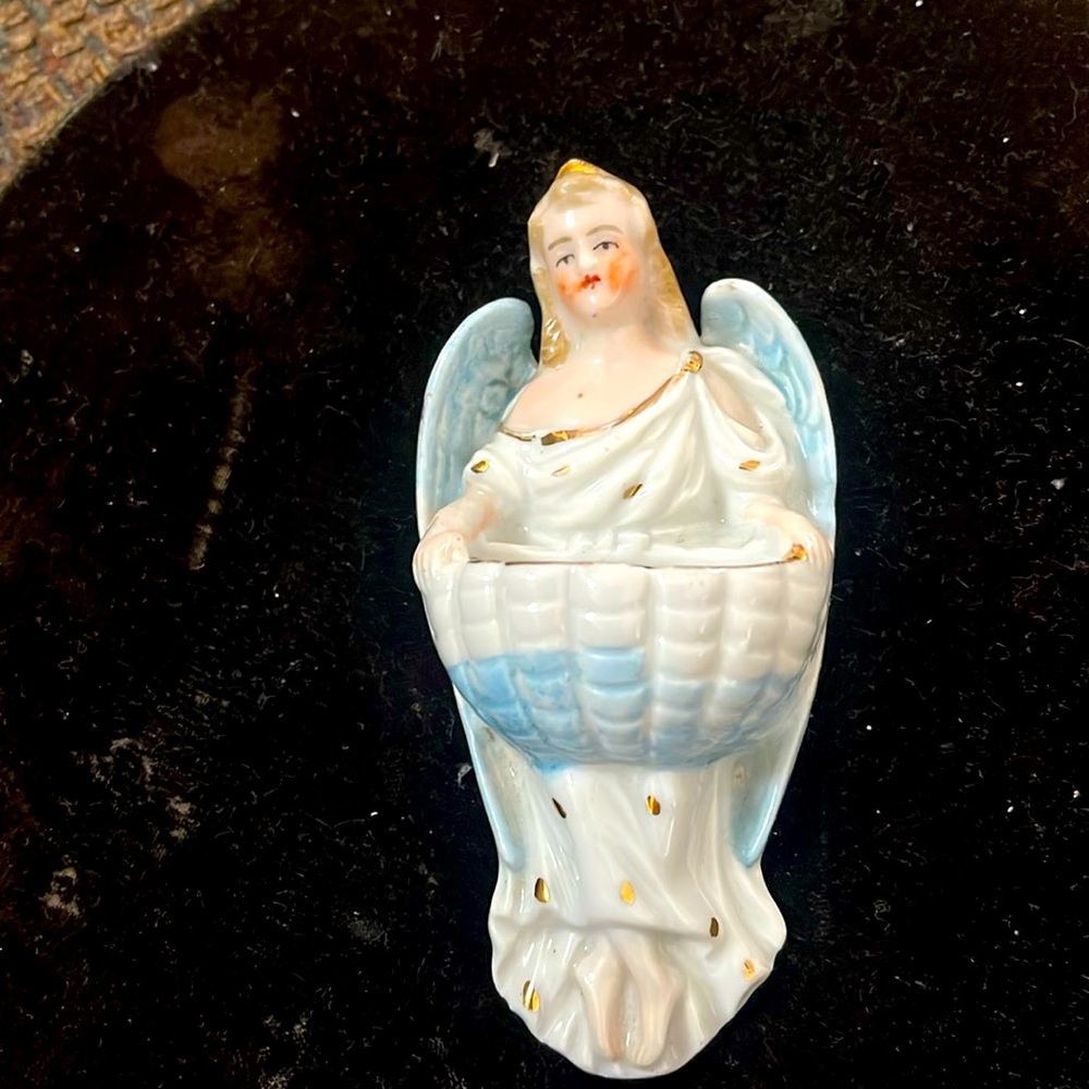 Angel to hold holy water#
